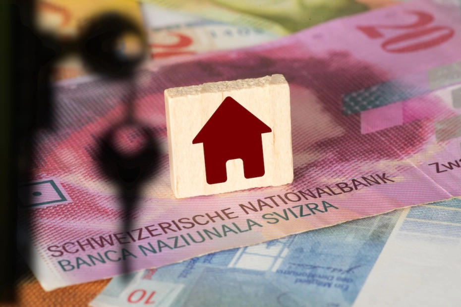 Franki szwajcarskie klucz i grafika domku